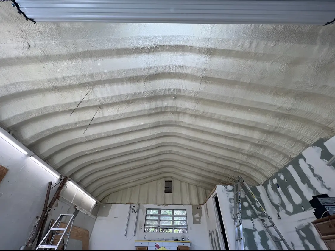 Spray polyurethane foam applied to the underside of a metal roof deck in Prior Lake